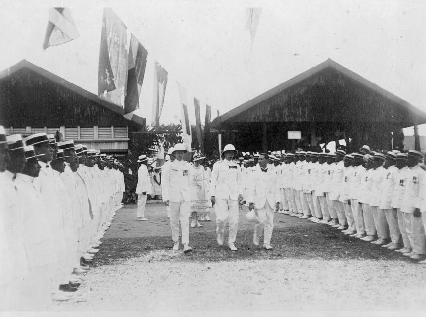 NZ Governor General Sir Bernard Fergusson and Resident Commissioner Judge Ayson inspect a guard of honour of returned servicemen in Avarua on May 3, 1926.  P/C NZ History 22123016