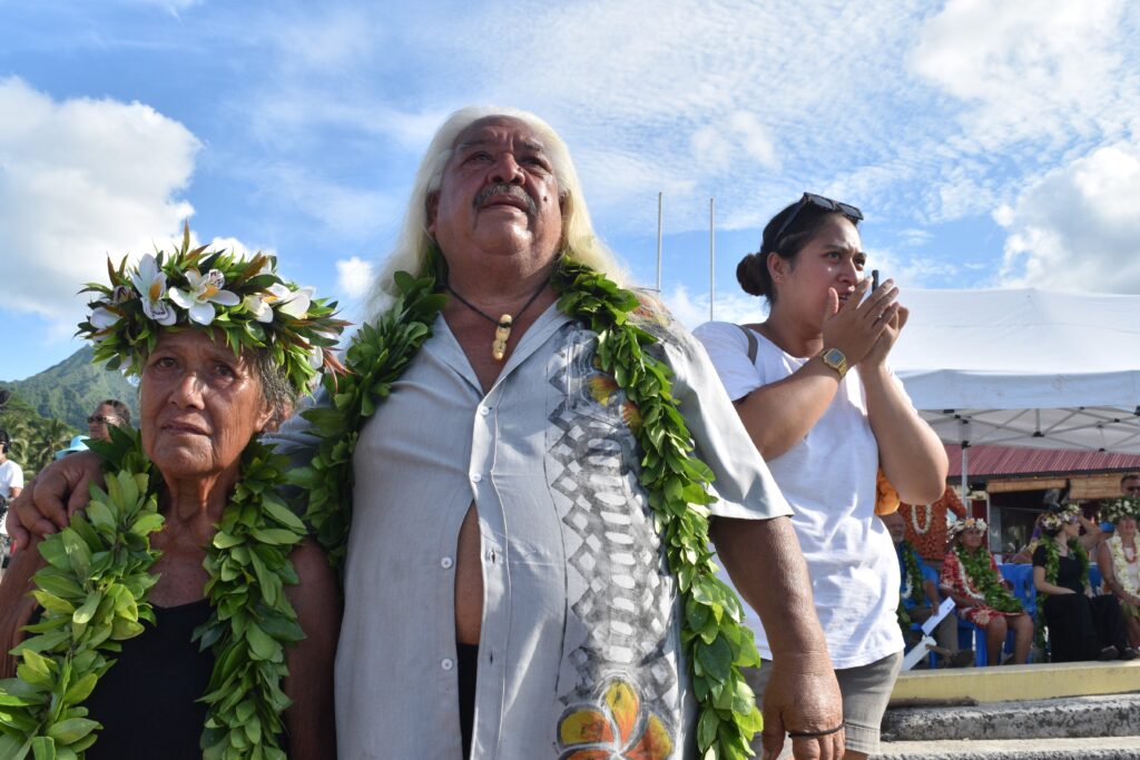 Tau’nga Mike Tavioni BEM and his wife Awhitia watch the Te Mana O Te Vaka canoes launch at sea for the first time. 23021630