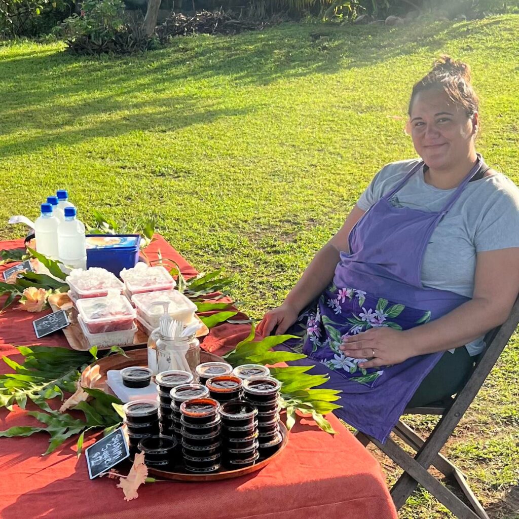 Vaea Maoate does her “side hustle” selling sashimi meals in Aitutaki. 23021725