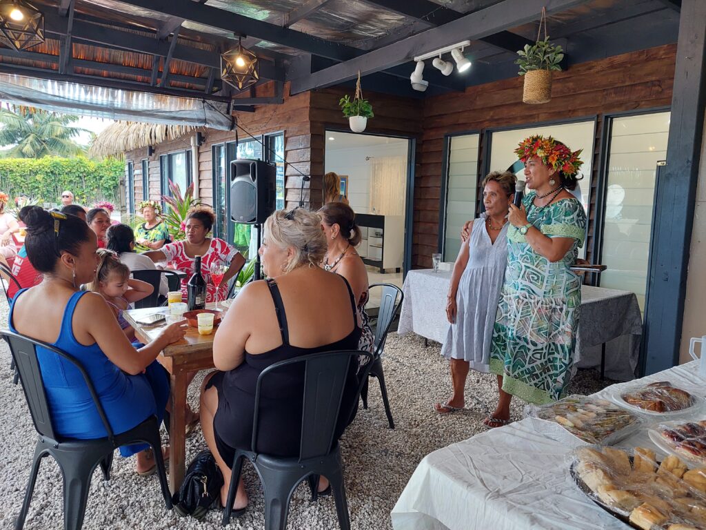 Lily Henderson, pictured far right, addresses the crowd alongside Sisi Short at the opening of Manna Boutique in Muri on Saturday. PHOTO: JOANNE HOLDEN / 23022110