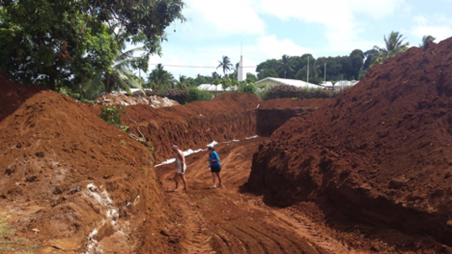 Contaminated soil on way out at island school