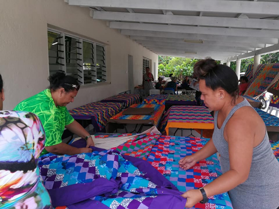 Island works through night on quilts