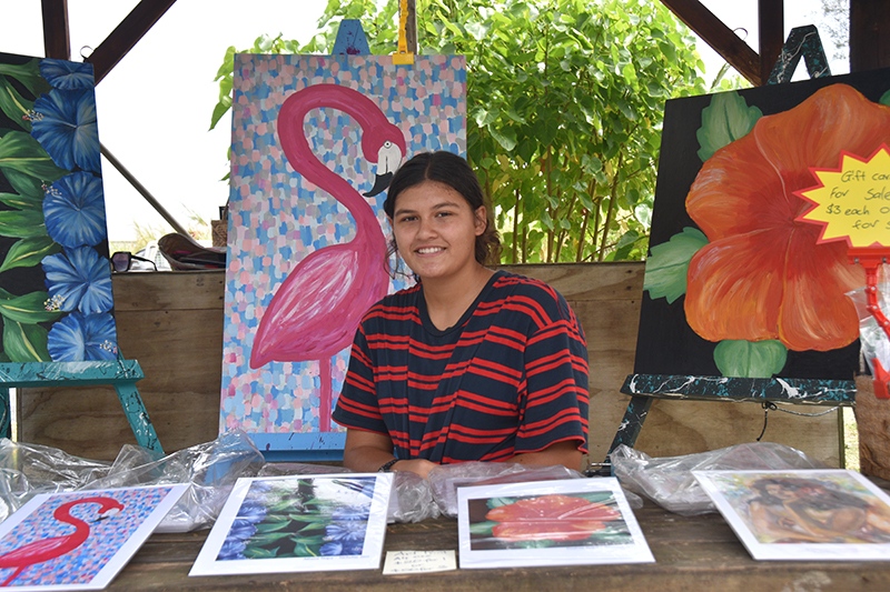 High school student combines art and business to help cover household bills