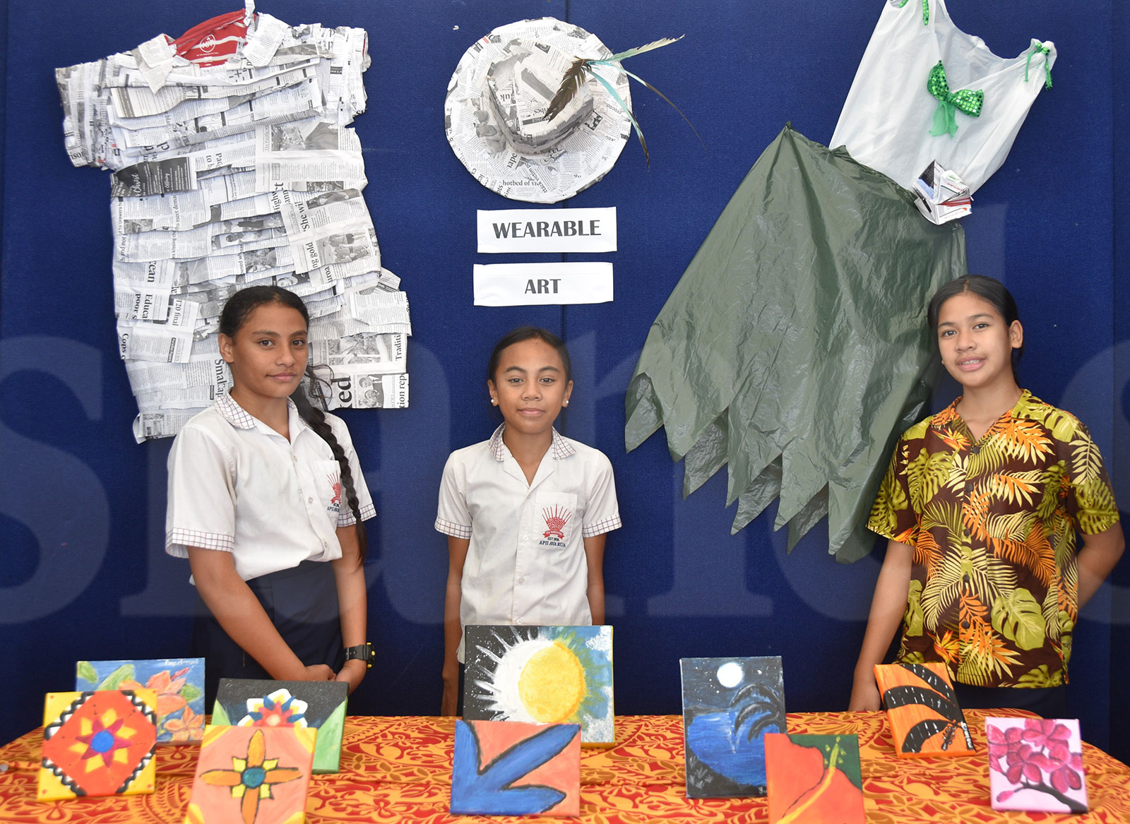 Apii Avarua students create wearable arts from newspaper cuttings