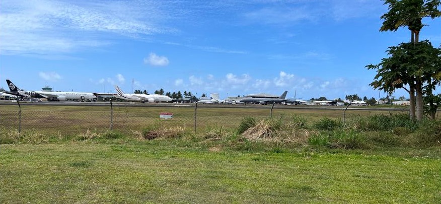 Jet aircraft line the tarmac at Rarotonga Airport