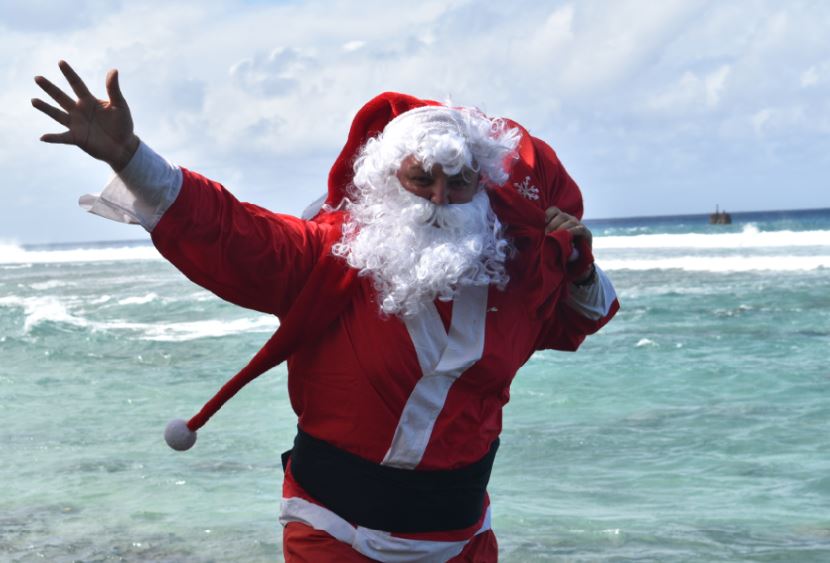 ‘Peace and love to all’: Santa prepares for tropical Christmas in the Cooks